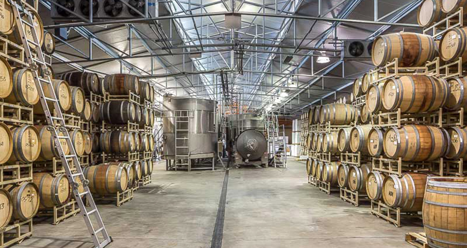 Interior of wine barrel storage facility